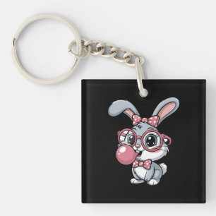 Porte-clés Lapin mignon avec des lunettes soufflant du chewin