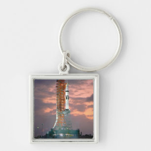 Porte-clés L'aube se brise derrière ASTP Saturn IB CDDT