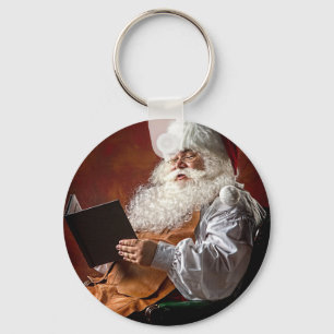 Porte-clés Le Père Noël lit le livre