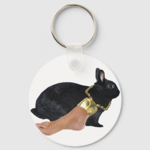 Porte-clés Le pied humain chanceux du lapin