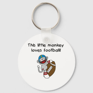 Porte-clés Le singe de chaussette aime le football