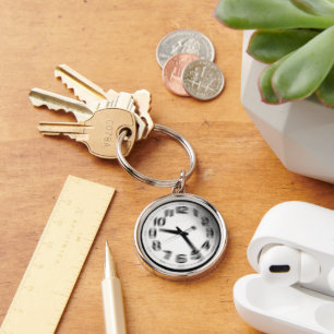 Porte-clés Le temps vole.