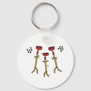Porte-clés Les trous de danse