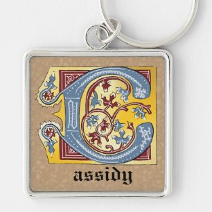 PORTE-CLÉS LETTRE BLEUE MOYENNE ET ROUGE LIVRE ÉCLAIRÉ C