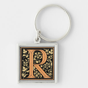 PORTE-CLÉS LETTRE NOIRE ET OR "R"