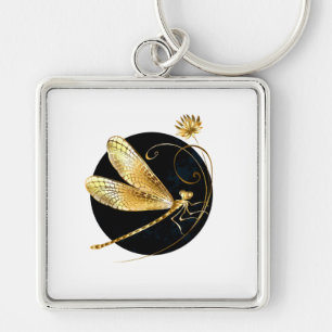 Porte-clés libellule d'or en cercle noir