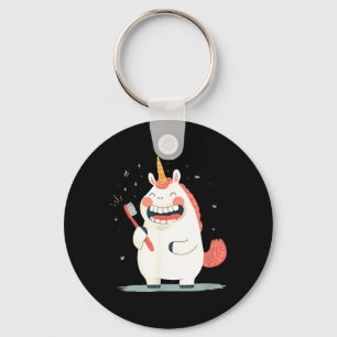 Porte-clés Licorne riante aux dents s'occupant d'un brosse à