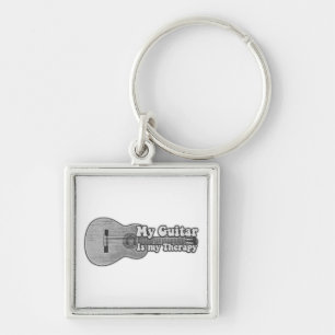 Porte-clés Ma guitare est ma thérapie. dos et guitare blanche