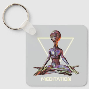 Porte-clés Méditation. Alien en pose tranquille