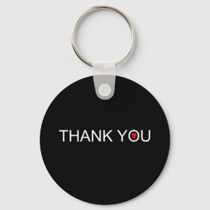Porte-clés Merci avec un coeur rouge