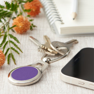 Porte-clés métallique ovale violet monstre