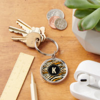 Porte-clés monogramme à motif tigre noir et orange