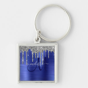 Porte-clés Monogramme en métal brosse à Parties scintillant à