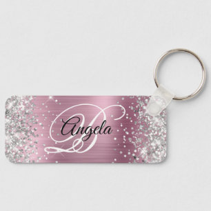 Porte-clés Monogramme fantaisie argenté pailleté sur fond ros