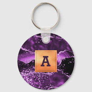 Porte-clés Monographie or en marbre violet