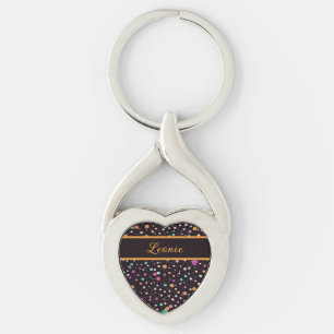 Porte-clés Motif noir avec des points et des fleurs colorés
