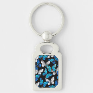 Porte-clés Motif sans couleur foncée avec papillons bleus Mor