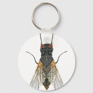 Porte-clés mouche de maison.