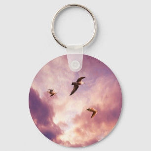Porte-clés Mouettes volant dans le ciel couché