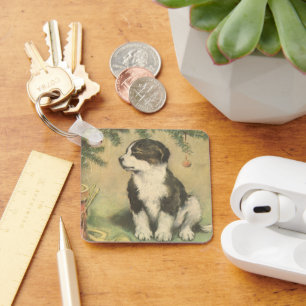 Porte-clés Noël vintage, chiot mignon sous l'arbre de Noël