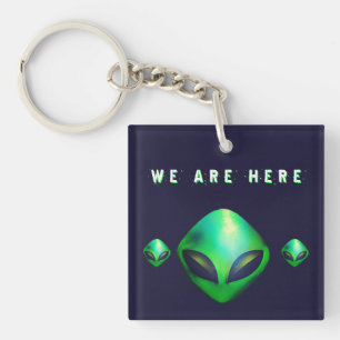 Porte-clés "Nous sommes ici" Tête d'alien vert
