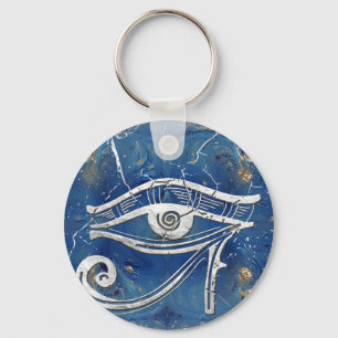 Porte-clés OEil égyptien en argent sur marbre bleu