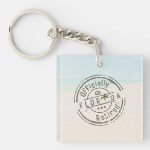 Porte-clés Officiellement à la retraite sur une plage tropica