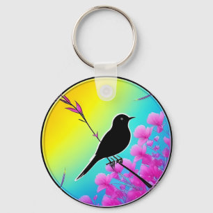 Porte-clés Oiseau sur une branche avec un fond artistique vib