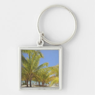 Porte-clés Palmiers sur une plage blanche de sable du