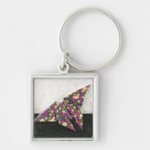 Porte-clés Papillon d'origami sur le papier floral