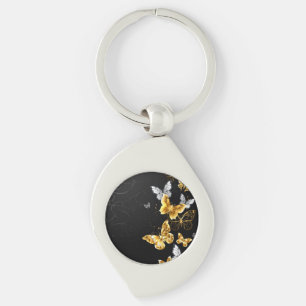 Porte-clés Papillons d'or et de blanc