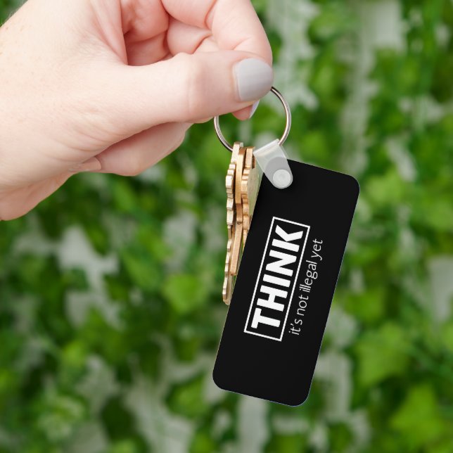 Porte-clés Pas illégal (main)