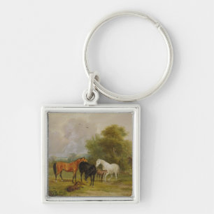 Porte-clés Pâturage de chevaux : Juments et poulains dans un
