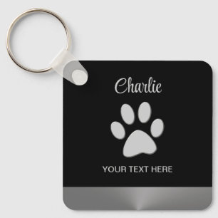 Porte-clés Paw Chien Argent sur arrière - plan noir