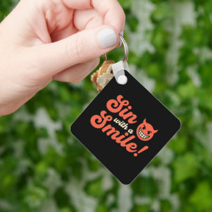 Porte-clés Pécher avec un Sourire
