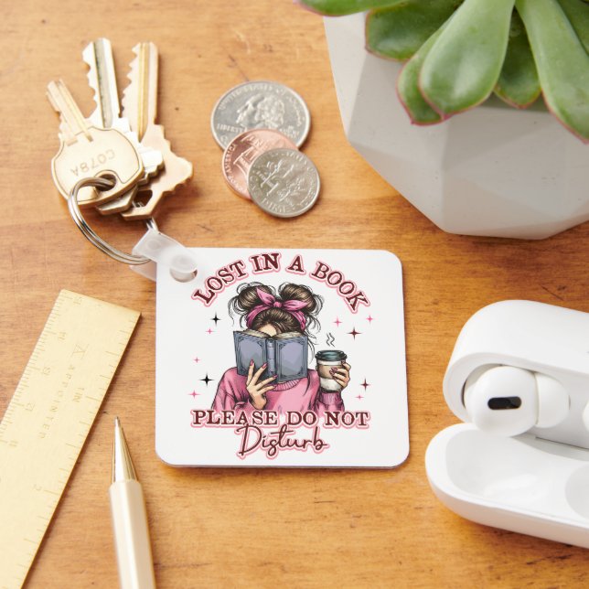 Porte-clés Perdu dans un livre... (Bureau)