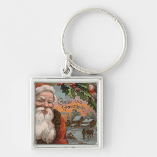 Porte-clés Père Noël avec Holly, scène de village