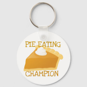 PORTE-CLÉS PIE MANGER CHAMPION CITROUILLE PIE