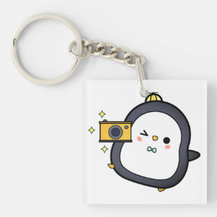 Porte-clés Pingouin, Caméra, Caractère
