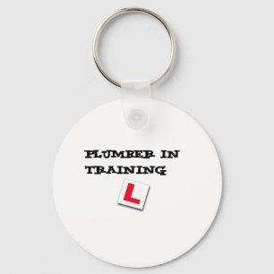 Porte-clés plombier en formation