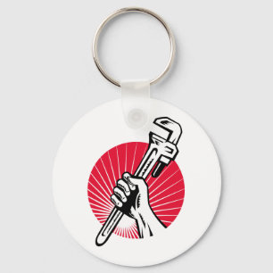 Porte-clés Plumber hand holding pipe wrench woodcut