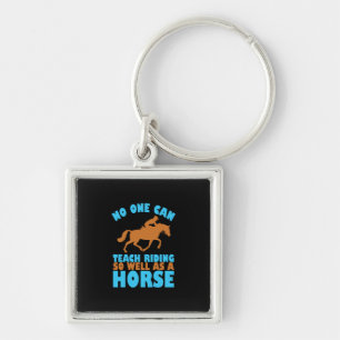 Porte-clés Poison d'Equestrian   No One Can Teach Riding
