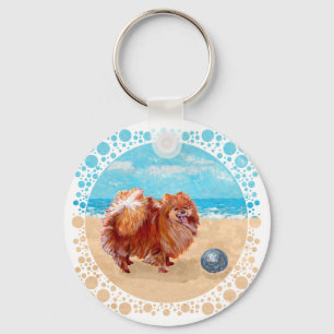 Porte-clés Poméranien au bord de mer