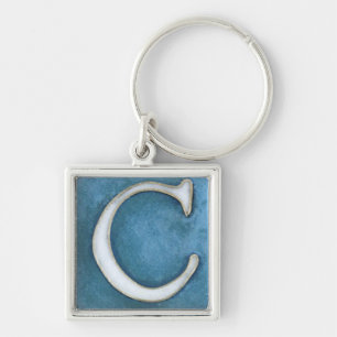 Porte-clés porte - clé initial, blanc et nuances de C de ble