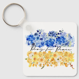 Porte-clés Priez pour la paix. Couleurs du drapeau ukrainien.
