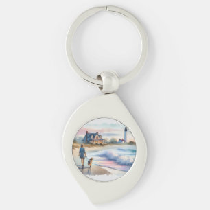 Porte-clés Promenade côtière jusqu'au phare au coucher du sol