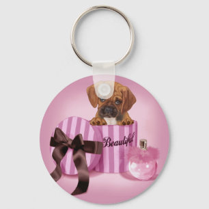 Porte-clés Puggle dans la boîte ronde rayée