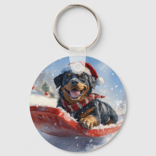Porte-clés Rottweiler en traîneau 'Qu'il neige' Noël