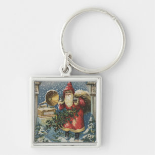 Porte-clés Salutation de NoëlPère Noël et Joueur de disques