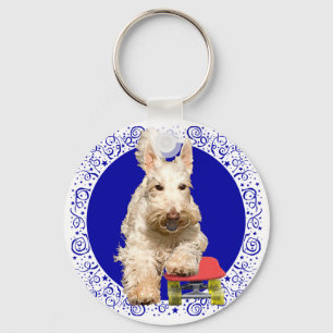Porte-clés Scottish Terrier roux sur un Skateboard
